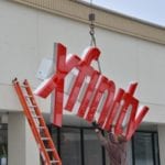 Raising Xfinity storefront sign