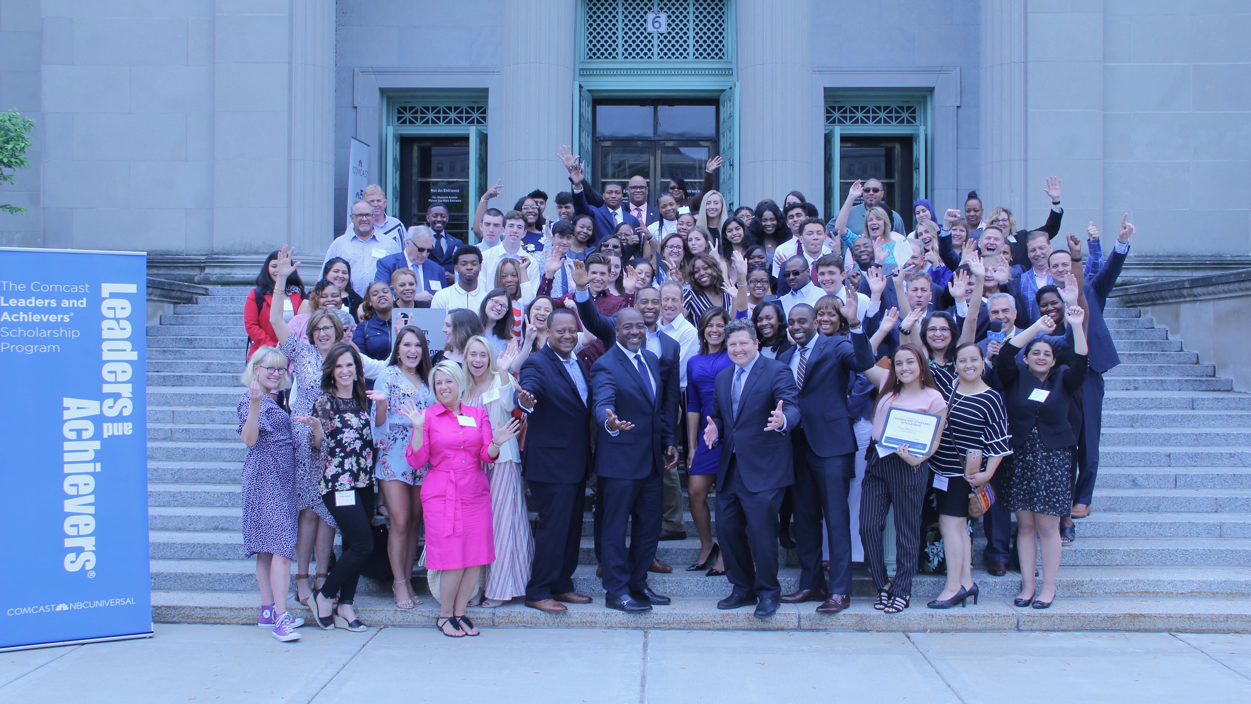 Leaders and Achievers group photo on large outdoor steps