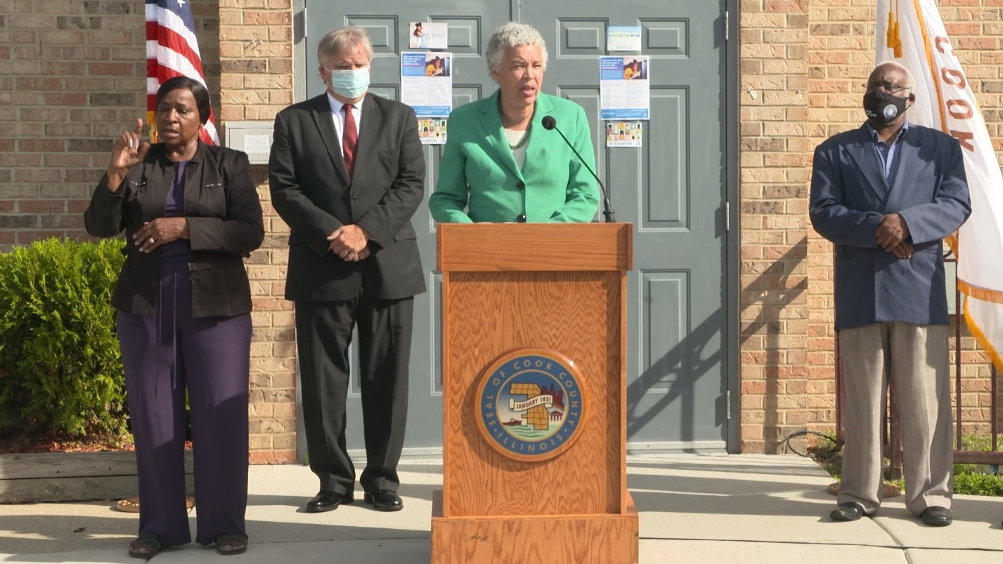 Housing Authority of Cook County representatives at a podium