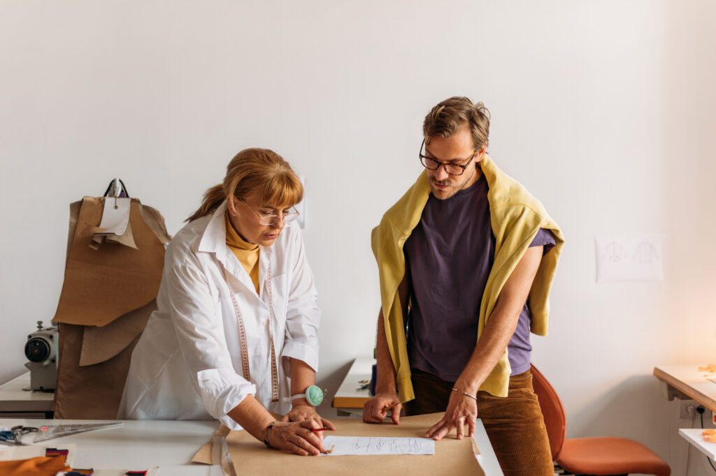 Man and woman working at a desk