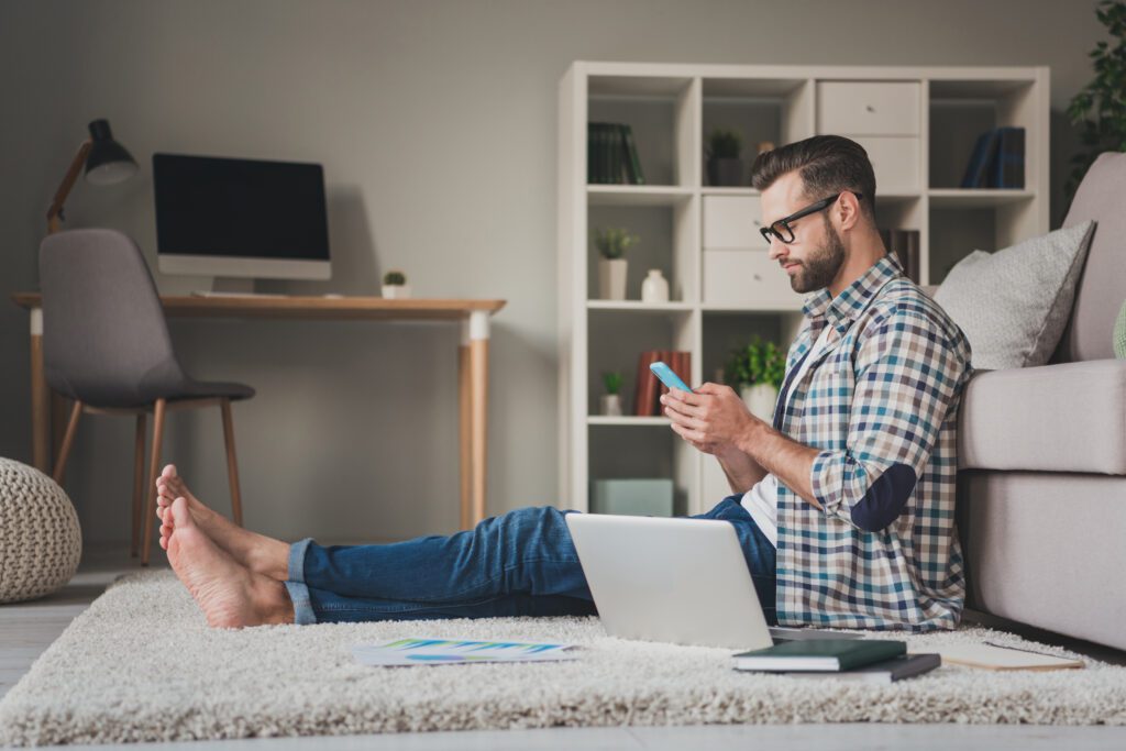 A young man on devices connected to Xfinity Internet in Illinois. They are a part of the company’s Five-Year Price Guarantee, offering no contract, unlimited data and one year of Unlimited Xfinity Mobile included.